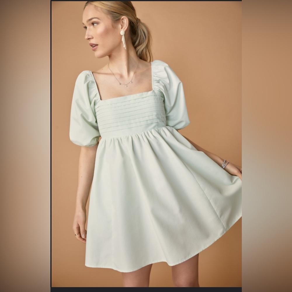 Francesca’s Lilya babydoll dress in mint green size Large